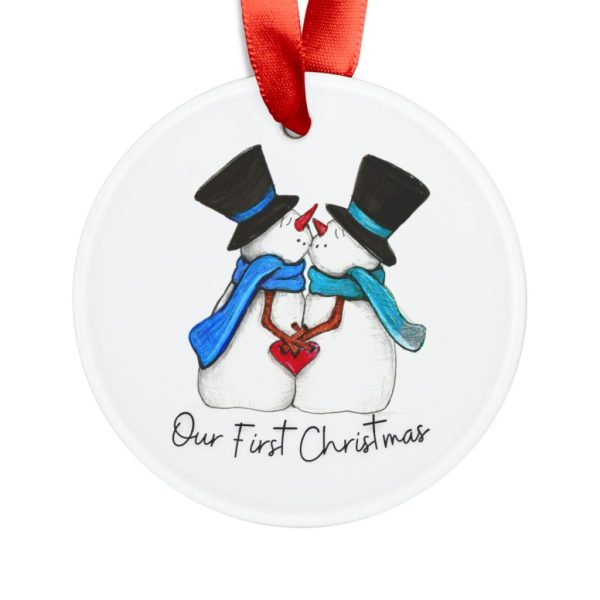 Our First Christmas snowmen ornament featuring two snowmen in scarves and top hats with a red heart and red ribbon.