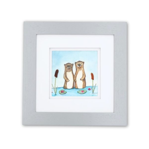 Framed “My Otter Half” Aroostook River Illustration featuring two otters with pebble noses and beach glass cattails.
