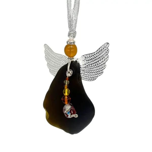 a piece of glass with an angel wing hanging from it