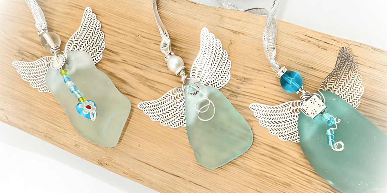 Three Aroostook River Angels made from large pieces of pale aqua river glass with silver filigree wings and bead accents.