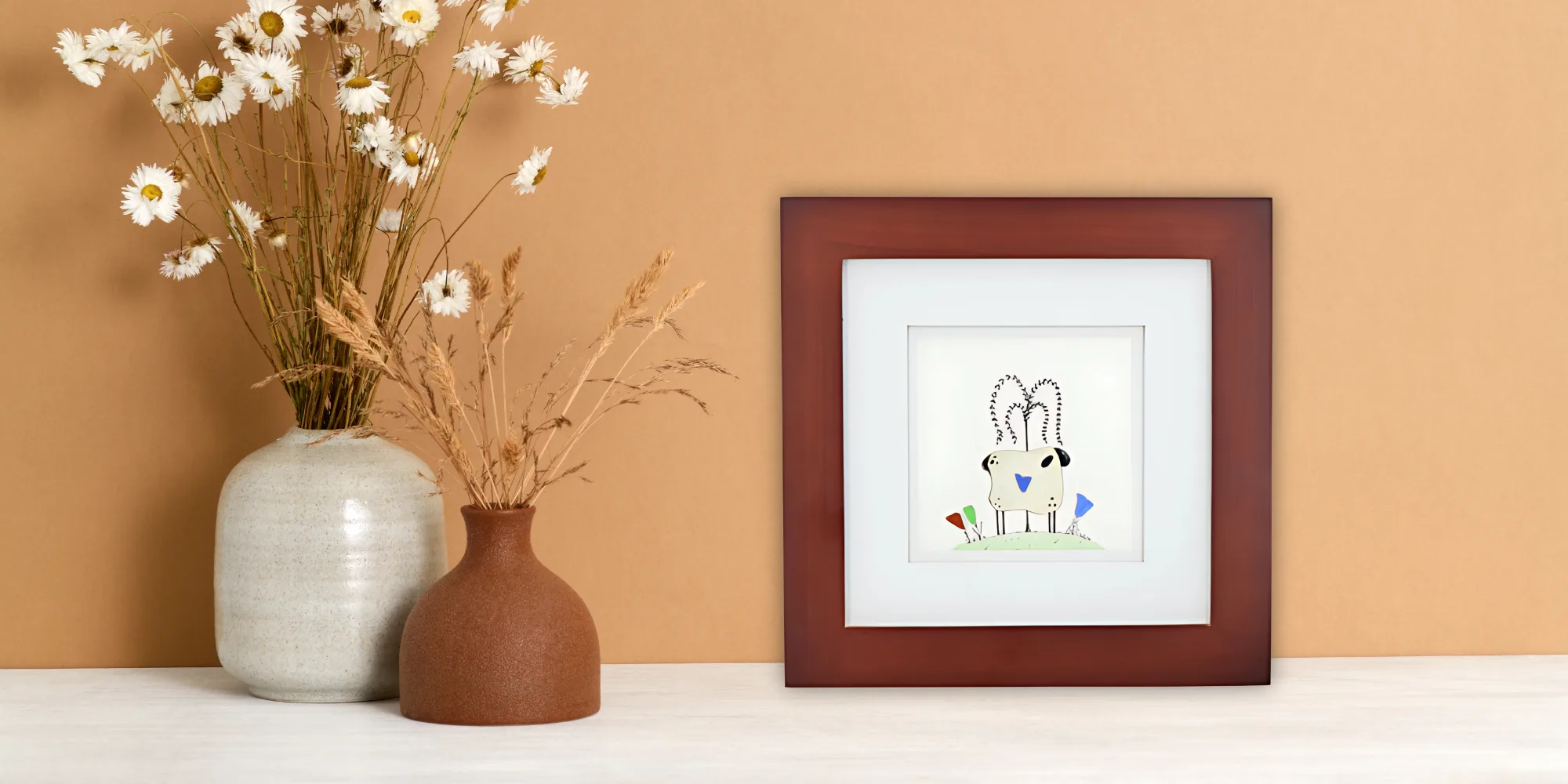 Framed original artwork by Riverbed Art on display next