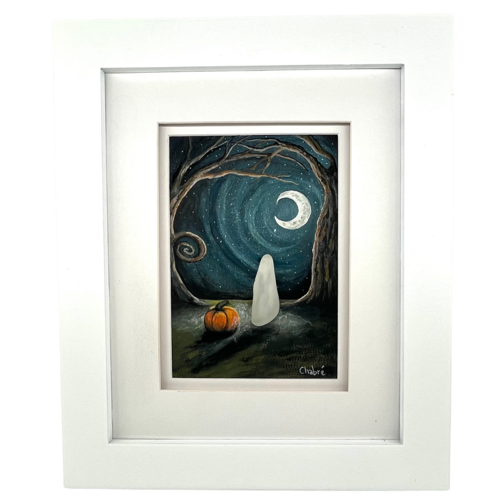 Original Aroostook River Illustration titled October Night by Riverbed Art, featuring a ghost made from handpicked Aroostook River beach glass beneath a crescent moon and swirling night sky, framed in white wood.