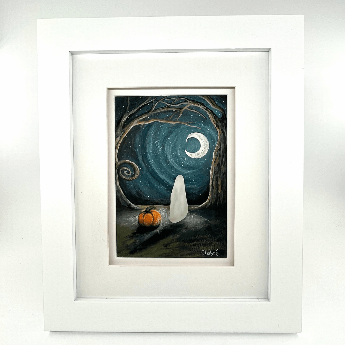 Framed gouache artwork October Night by Riverbed Art, featuring a moonlit scene with a ghost crafted from Aroostook River glass and a small pumpkin.