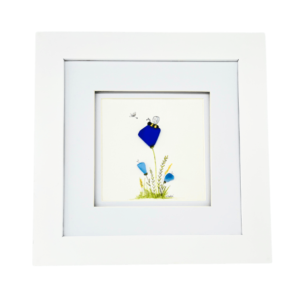 Framed Aroostook River illustration titled Rest featuring three blue river glass flowers in a soft nature scene