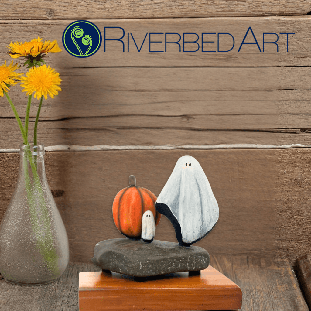 Baby Boo’s Harvest Hoedown stone ghosts and pumpkin beneath the Riverbed Art logo beside yellow flowers
