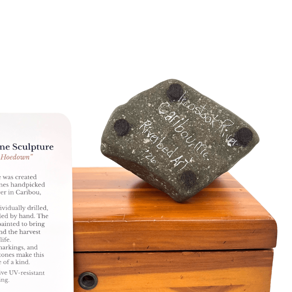 Underside of the stone base with Riverbed Art signature, Caribou, Maine inscription, 2026 date, and four felt pads