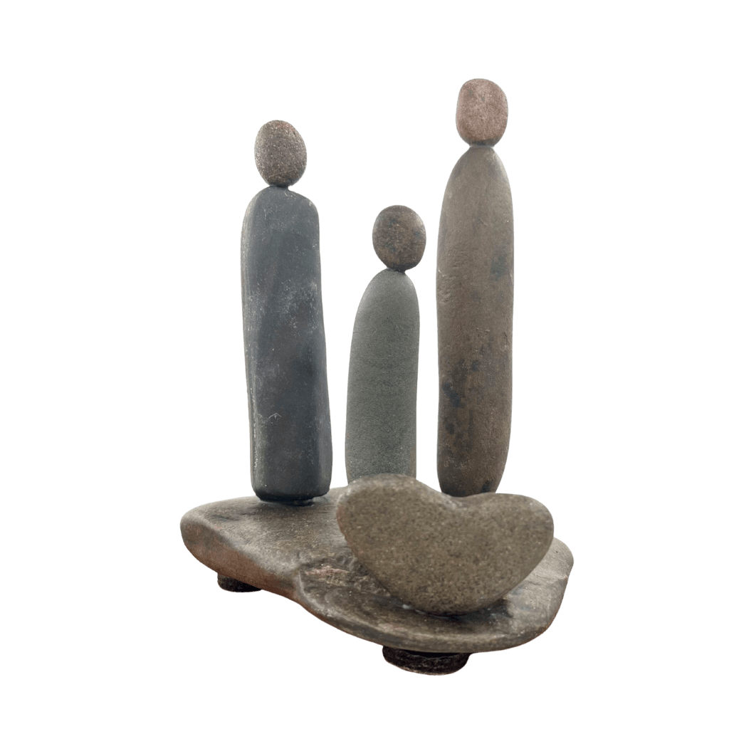 Family & Love Aroostook River stone sculpture with three figures and heart shaped stone