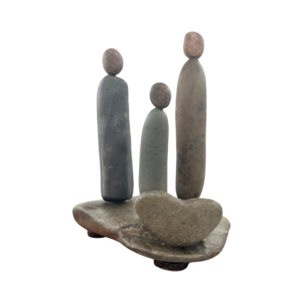 Family & Love Aroostook River stone sculpture with three figures and heart shaped stone
