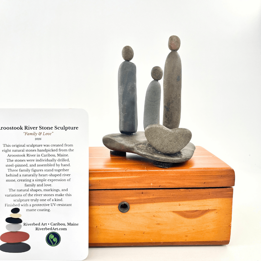 Family & Love Aroostook River stone sculpture displayed with provenance card