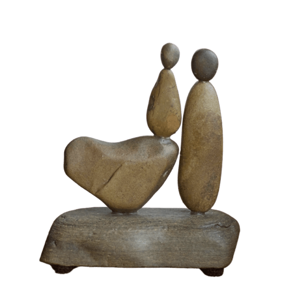 My Daughter, My Heart Aroostook River stone sculpture featuring mother and daughter figures with a naturally shaped stone heart.