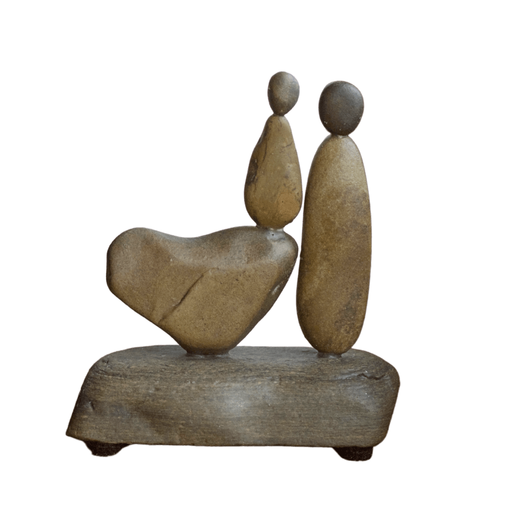 My Daughter, My Heart Aroostook River stone sculpture featuring mother and daughter figures with a naturally shaped stone heart.