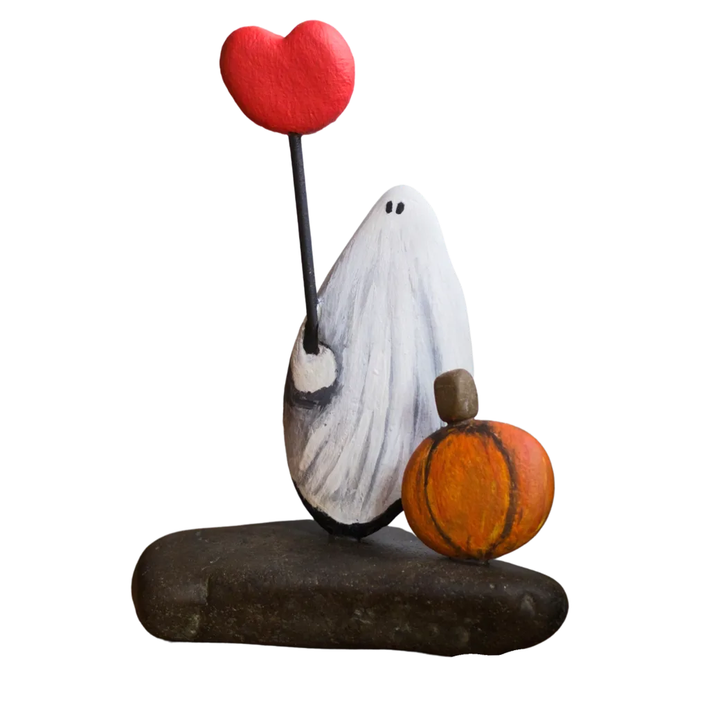 Pumpkin Patch Love stone sculpture featuring a white ghost holding a red heart beside an orange pumpkin.